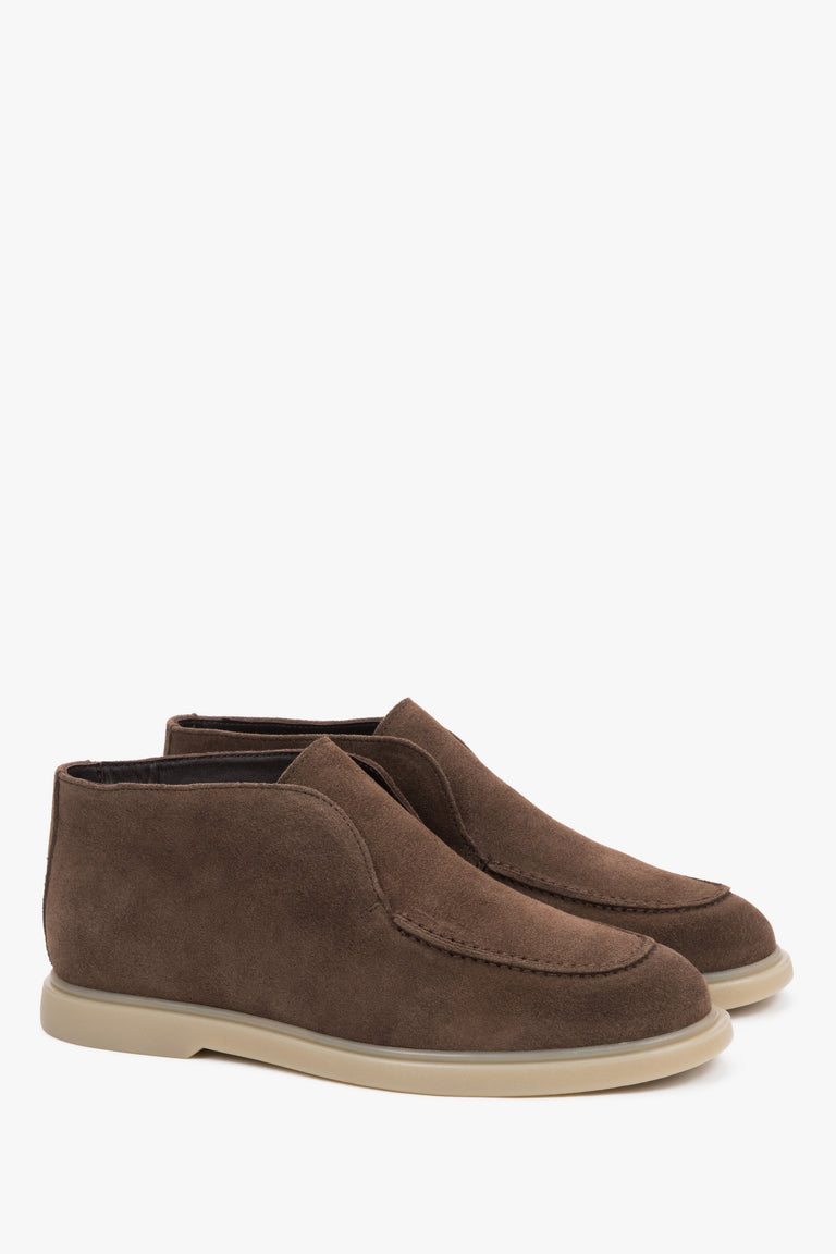 Brown slip-on women’s platform shoes by Estro.