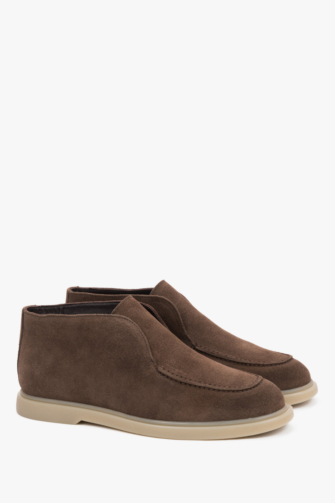 Brown slip-on women’s platform shoes by Estro.