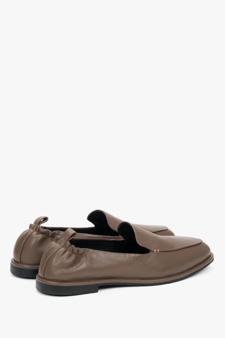 Angled view of women's brown leather slip on loafers