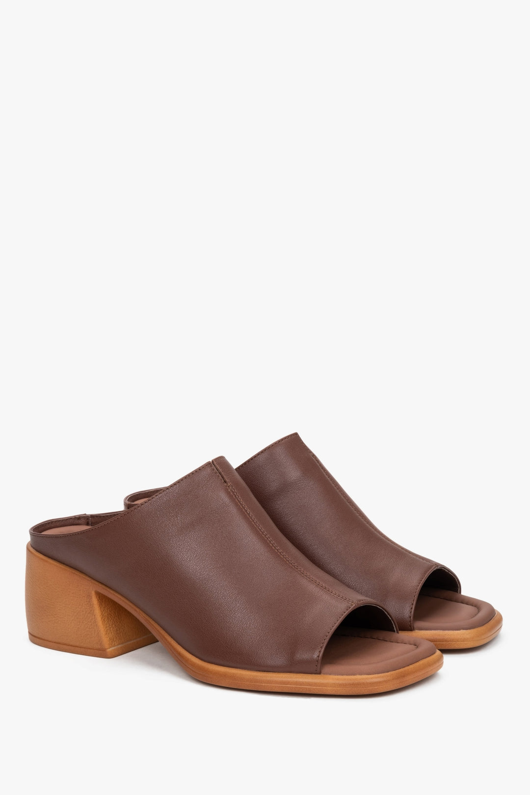 Brown women’s leather mules on a stable block heel.