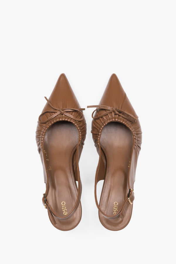 Women’s brown leather slingback pumps by Estro with a kitten heel – top view.