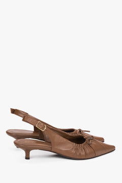 Women’s brown genuine leather slingback pumps with a kitten heel.