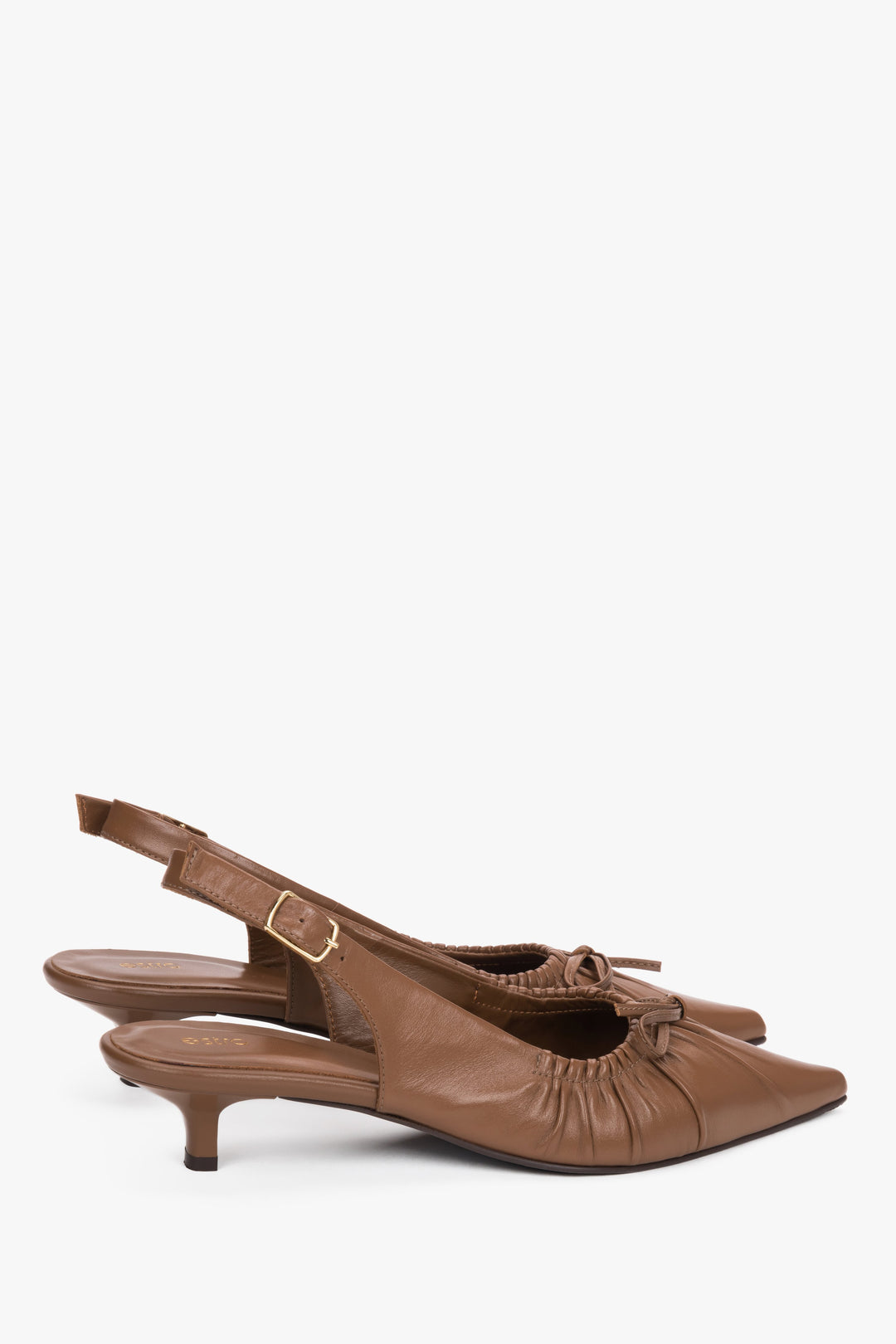 Women’s brown genuine leather slingback pumps with a kitten heel.