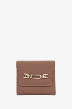 Women's brown leather tri-fold wallet by Estro.