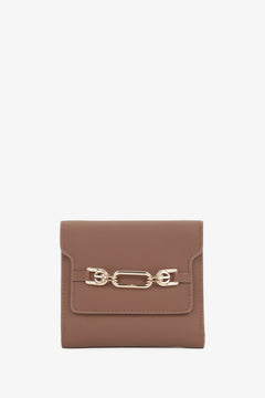 Women's brown leather tri-fold wallet by Estro.