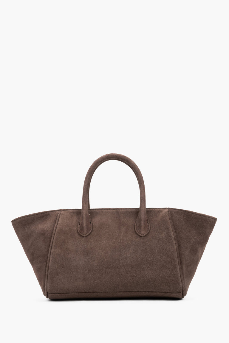 Minimalist, smooth back of a horizontal velour bag, highlighting its structured silhouette and precise stitching.