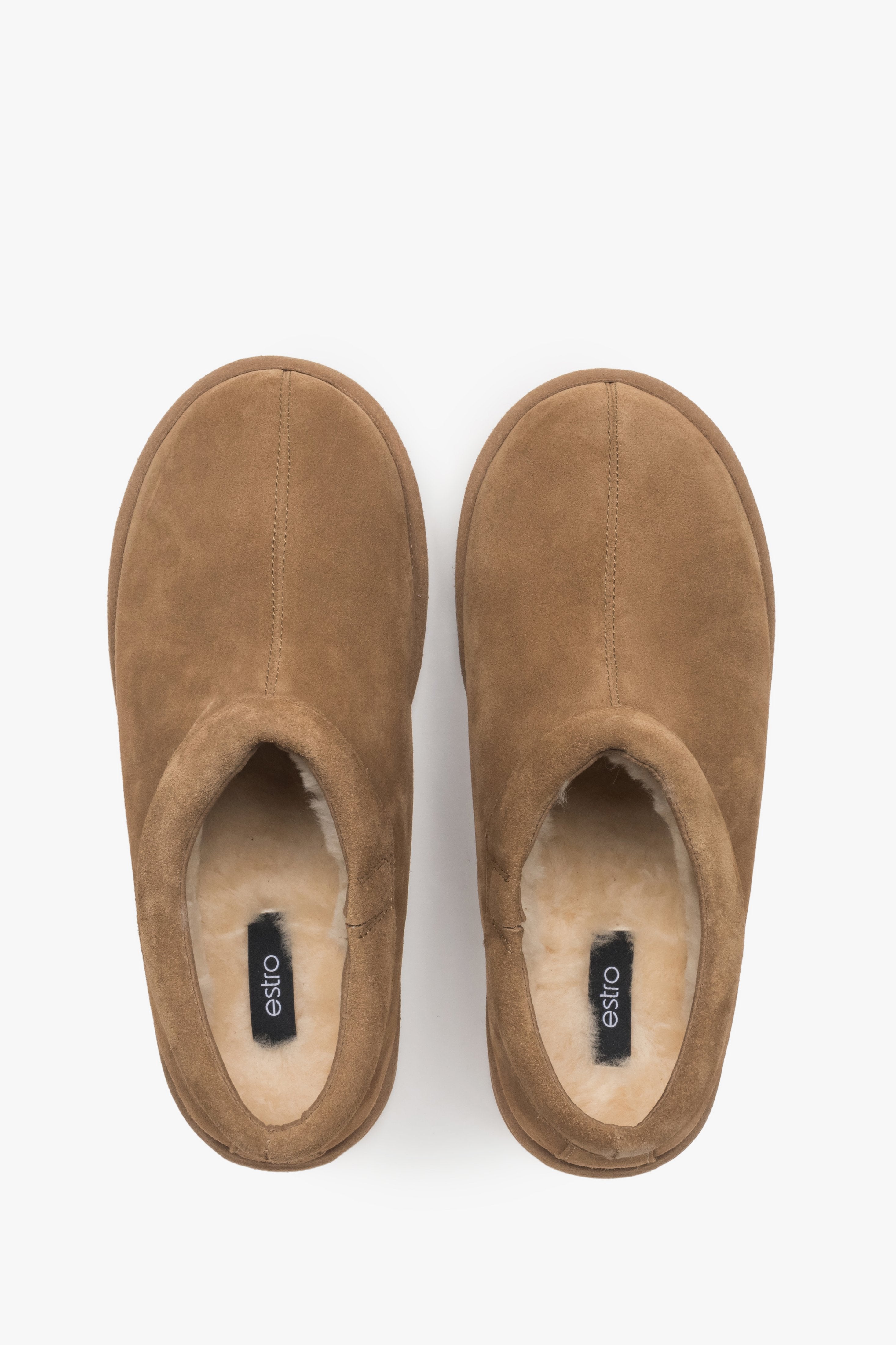 On a flexible platform, women's brown velour clogs with fur lining Estro.
