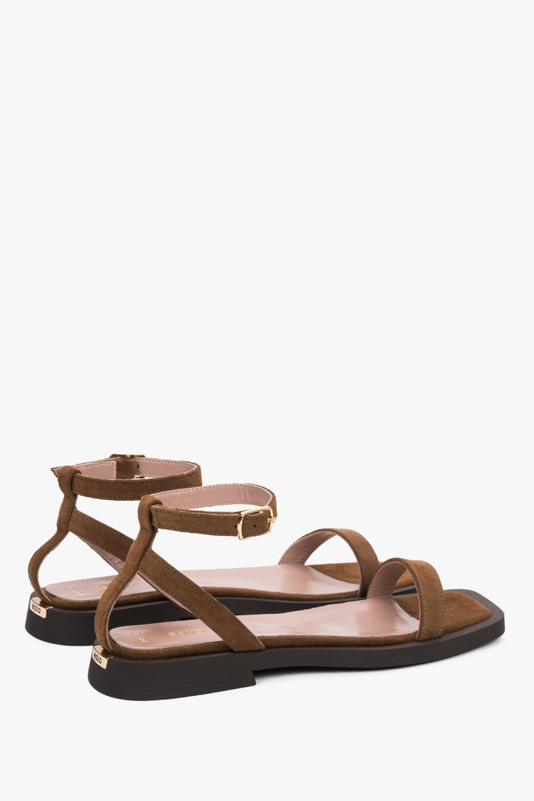 Women’s brown velour sandals with flexible TR sole and buckle fastening.