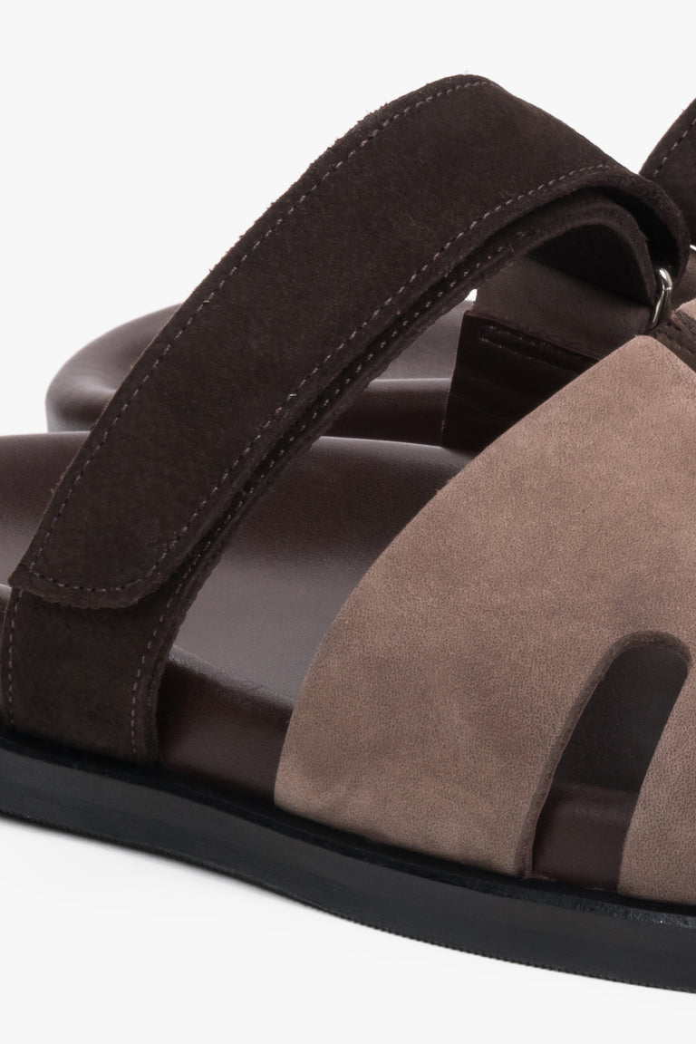 Brown leather and velour women’s slides with an adjustable strap by Estro - close-up on details.