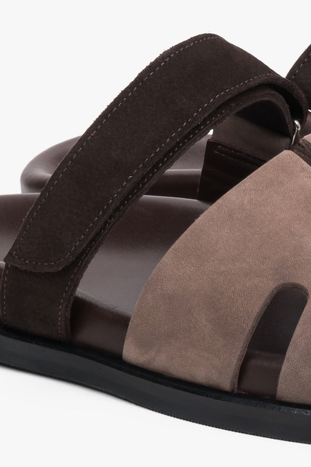 Brown leather and velour women’s slides with an adjustable strap by Estro - close-up on details.