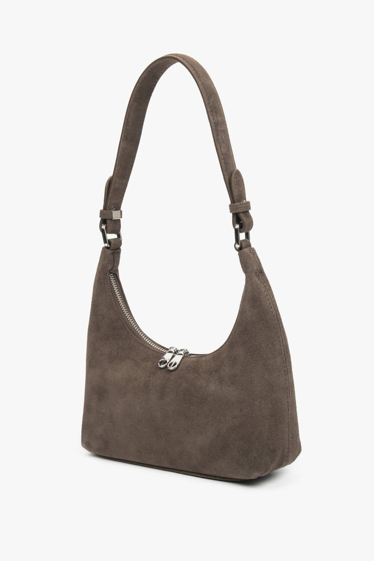 Women's brown genuine velour shoulder bag in half-moon shape.
