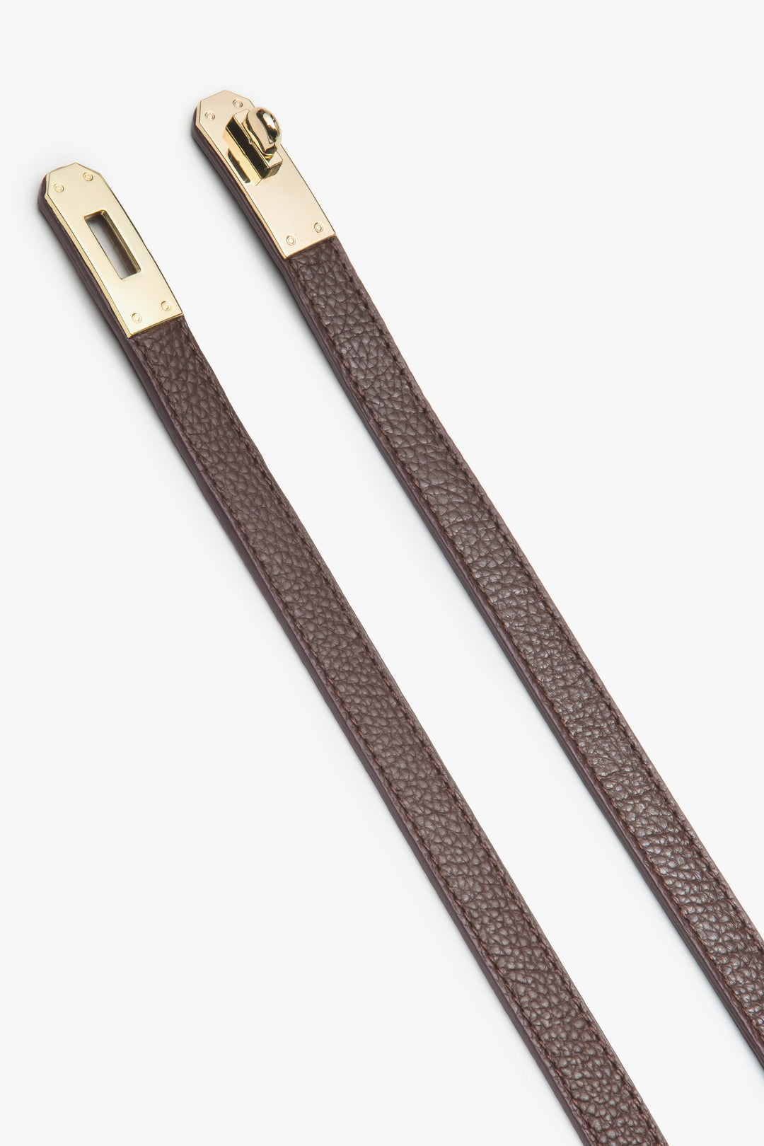 Women's burgundy leather belt with gold accents.