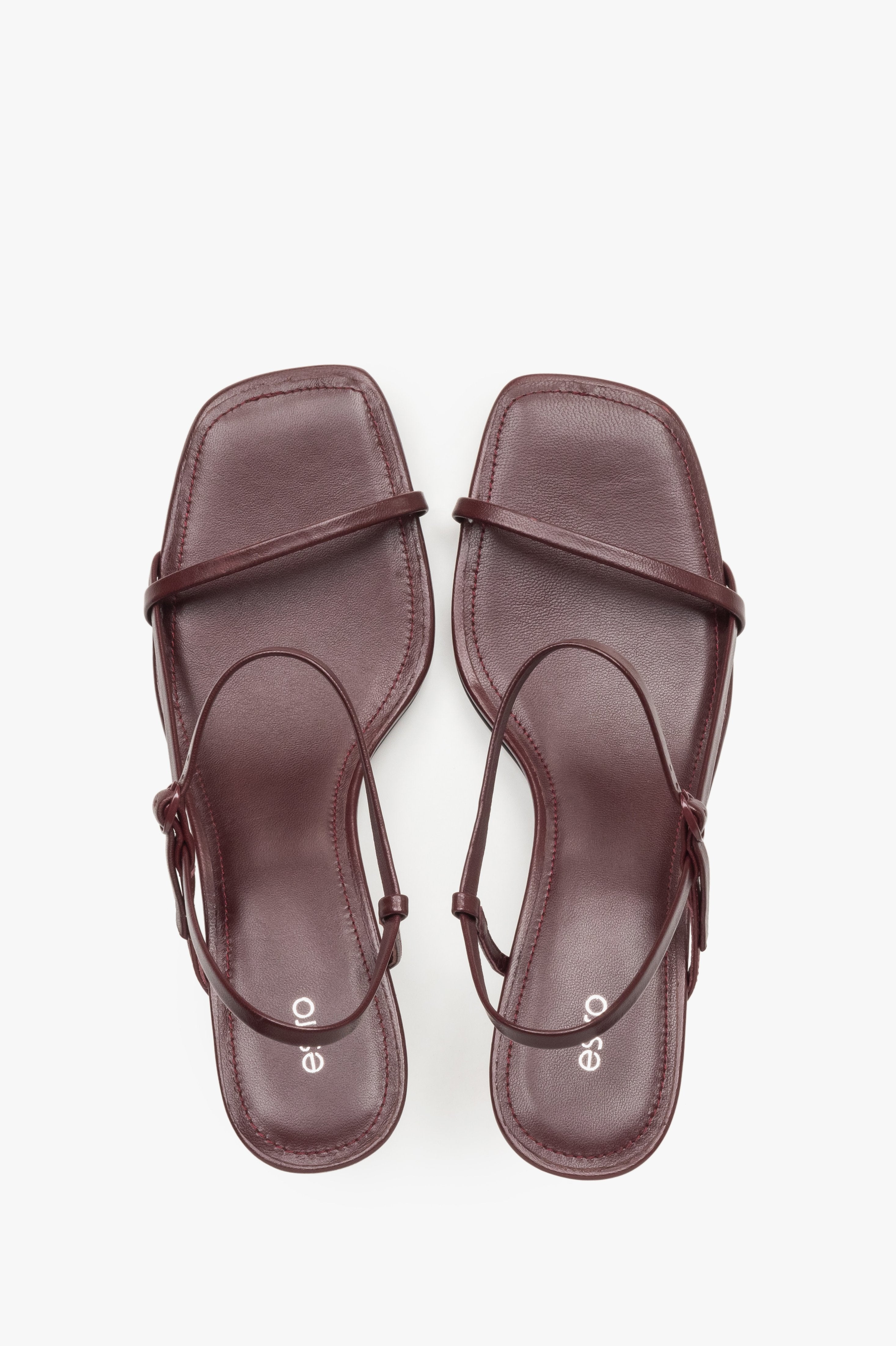 Women’s burgundy low-heel sandals made from genuine leather, featuring thin straps by Estro – top view.