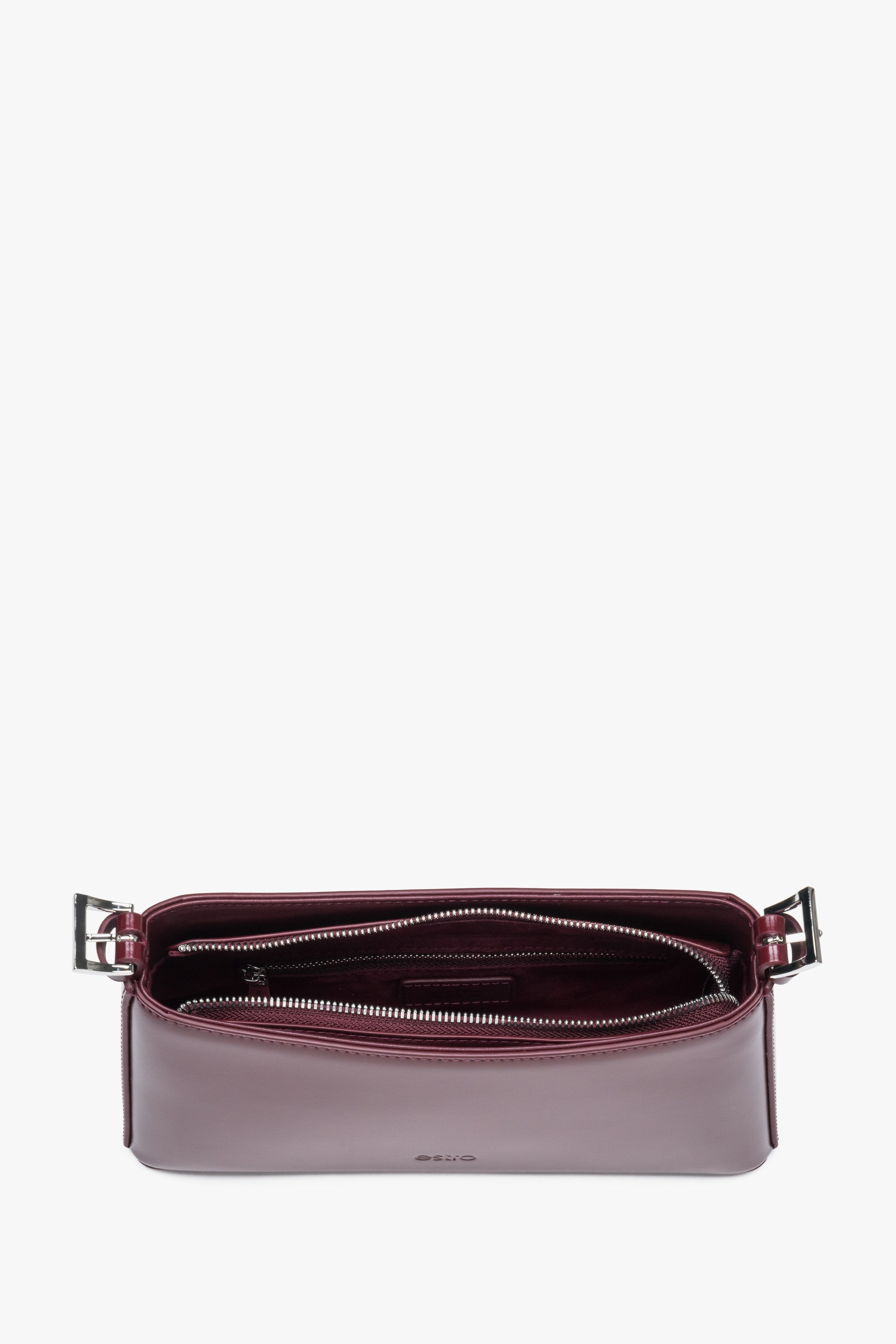 Top view of burgundy shoulder bag with zipper closure and compact shape.