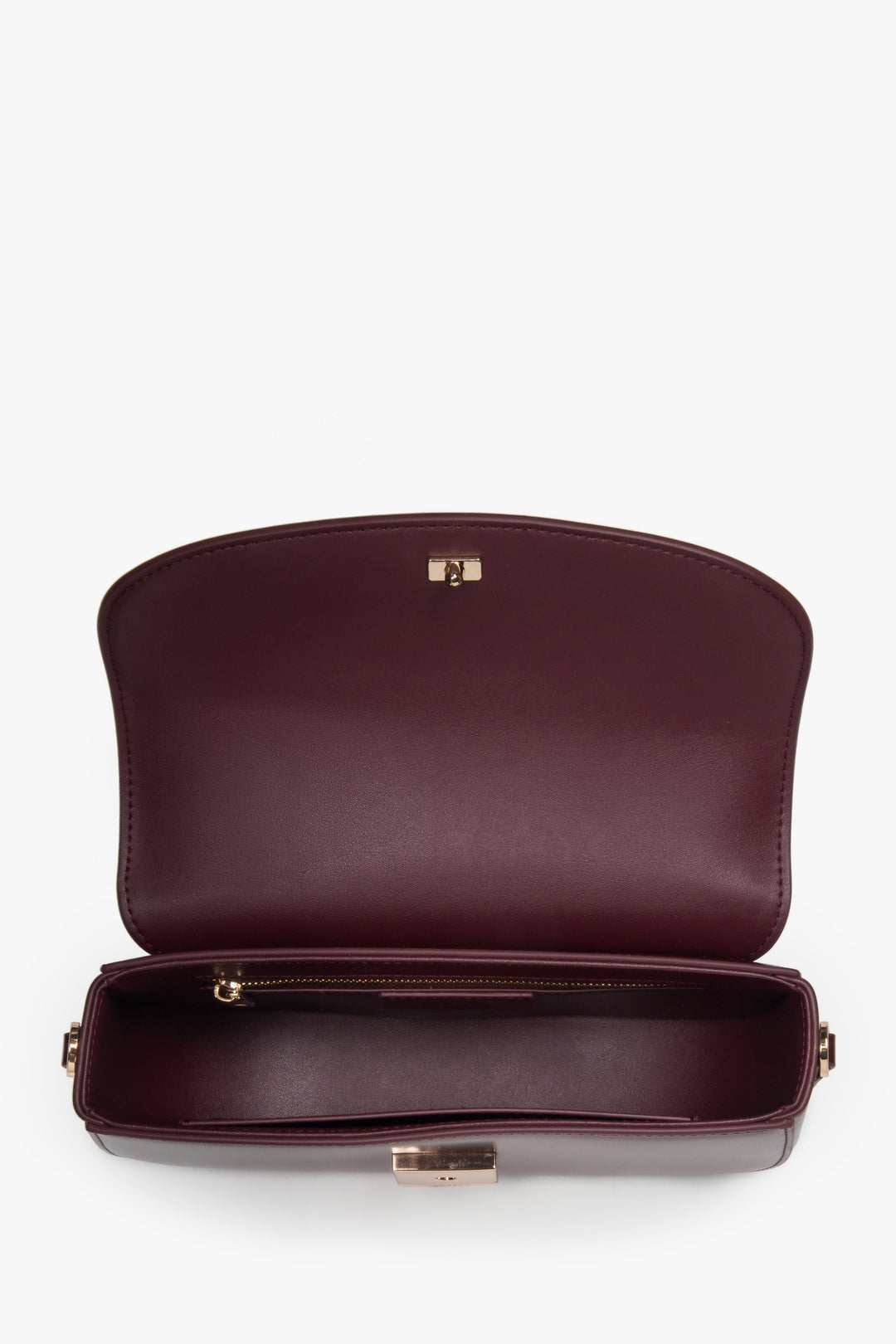 Stylish burgundy genuine leather handbag with snap closure.