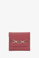 Women's burgundy leather tri-fold wallet by Estro.