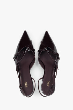 A sensual open-back cut and sleek silhouette – slingback design in the season’s most coveted colour.