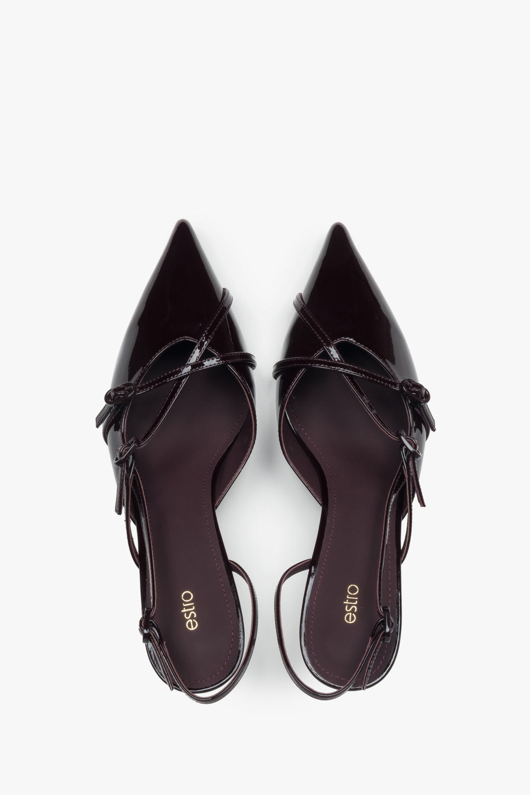 A sensual open-back cut and sleek silhouette – slingback design in the season’s most coveted colour.