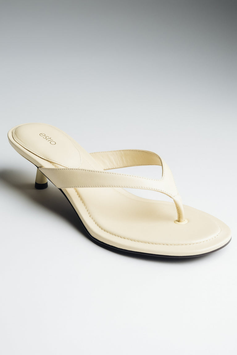 Women's butter yellow leather kitten heel mules by Estro