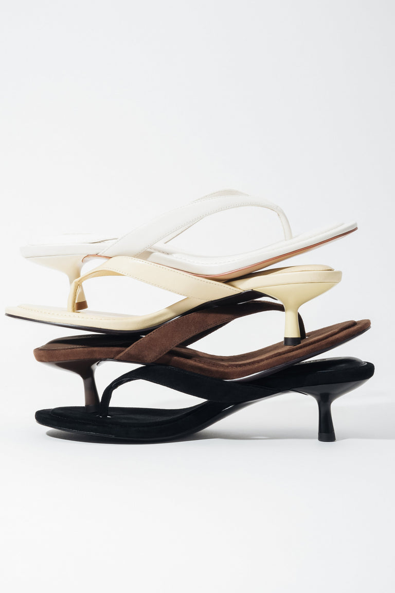 Three pairs of women's thong-style kitten heel mules by Estro