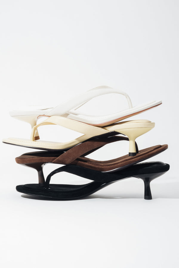 Three pairs of women's thong-style kitten heel mules by Estro