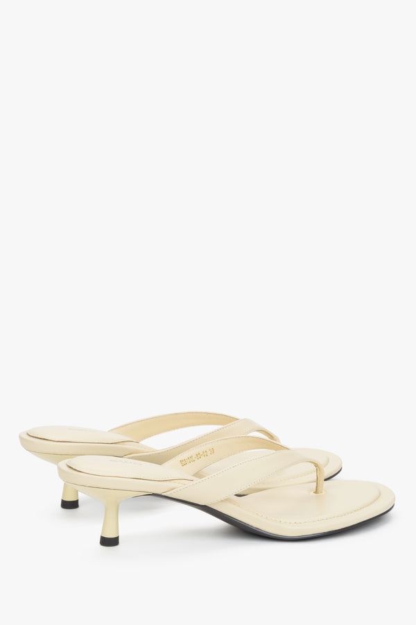 Back profile of women's butter yellow kitten heel mules by Estro