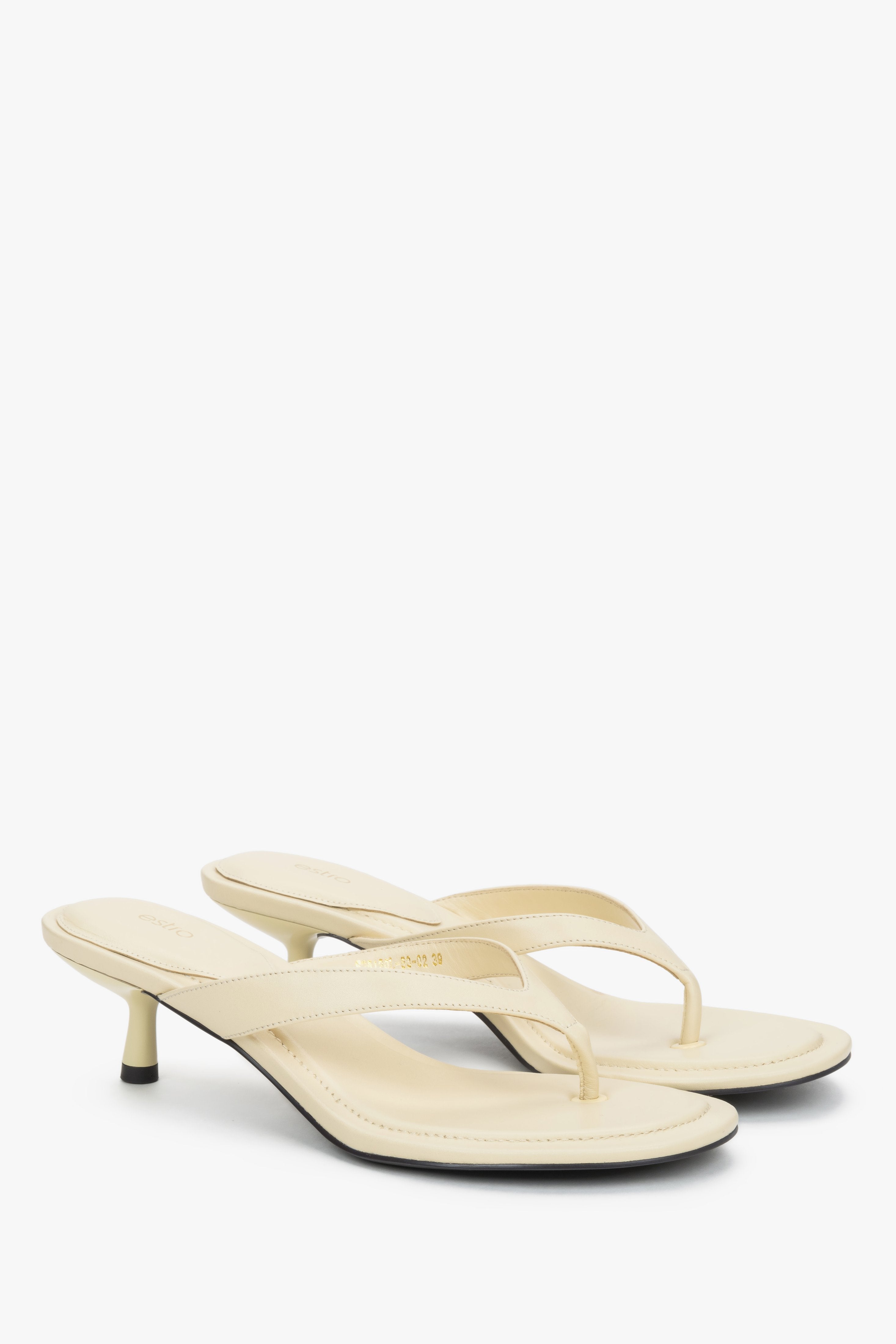 Women's butter yellow leather kitten heel mules by Estro - side view