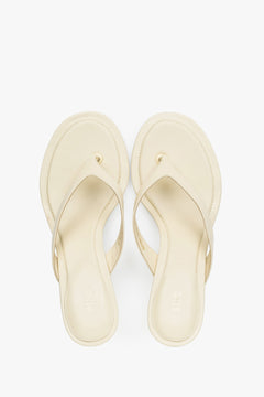 Top view of women's butter yellow leather mules by Estro