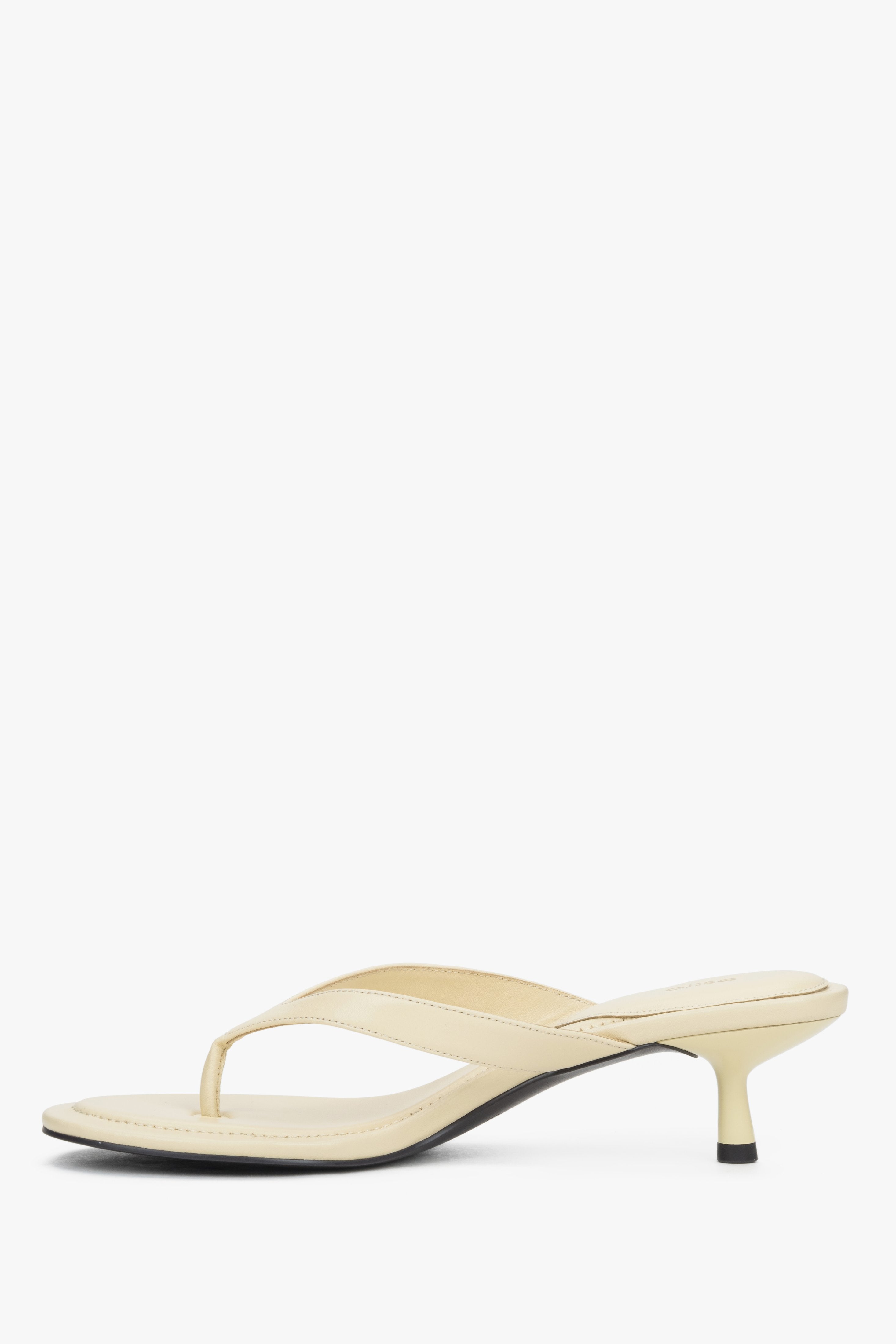 Side profile of women's butter yellow kitten heel mules by Estro