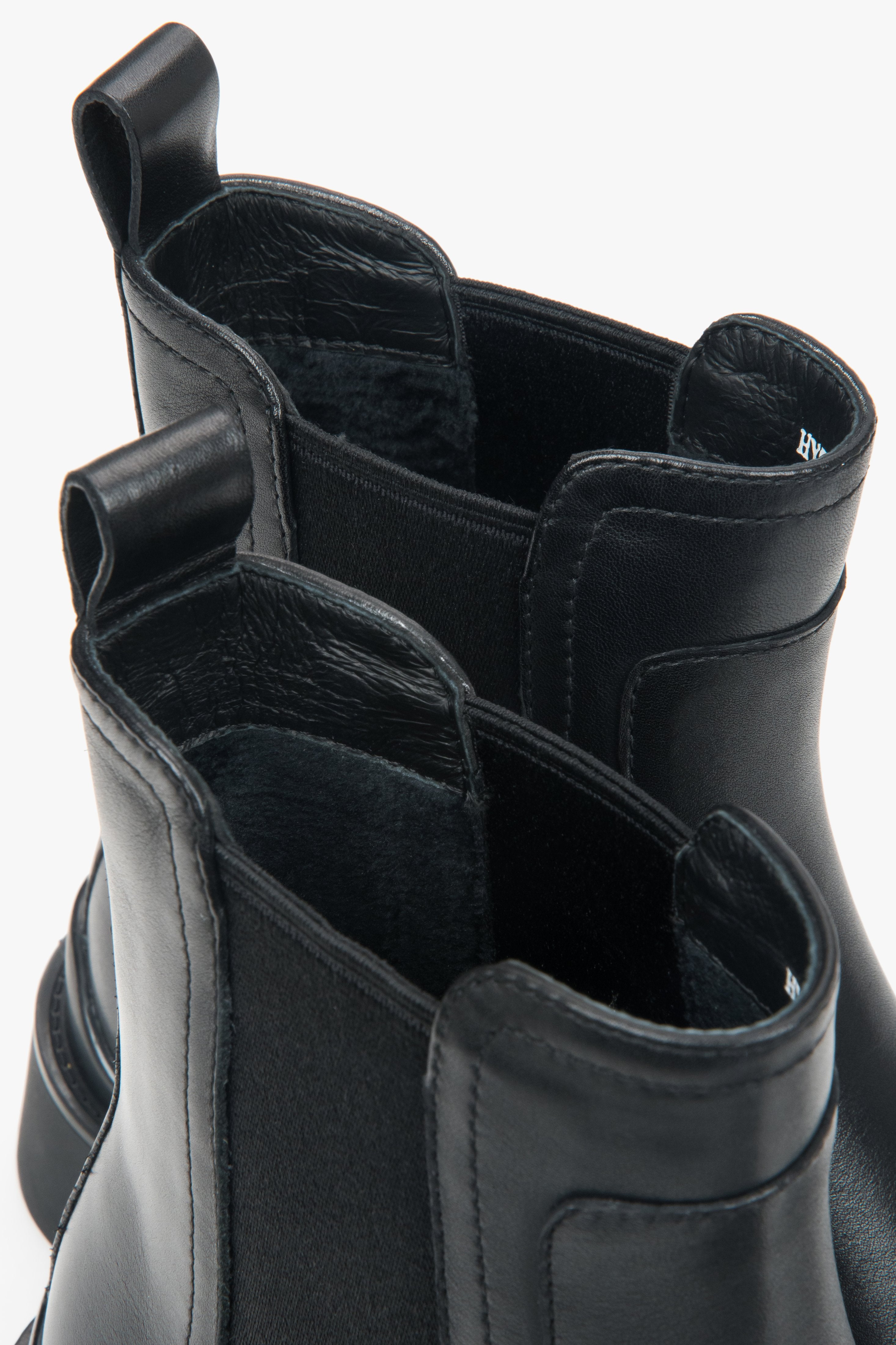 Women's black classic Chelsea boots by Estro with light insulation.


