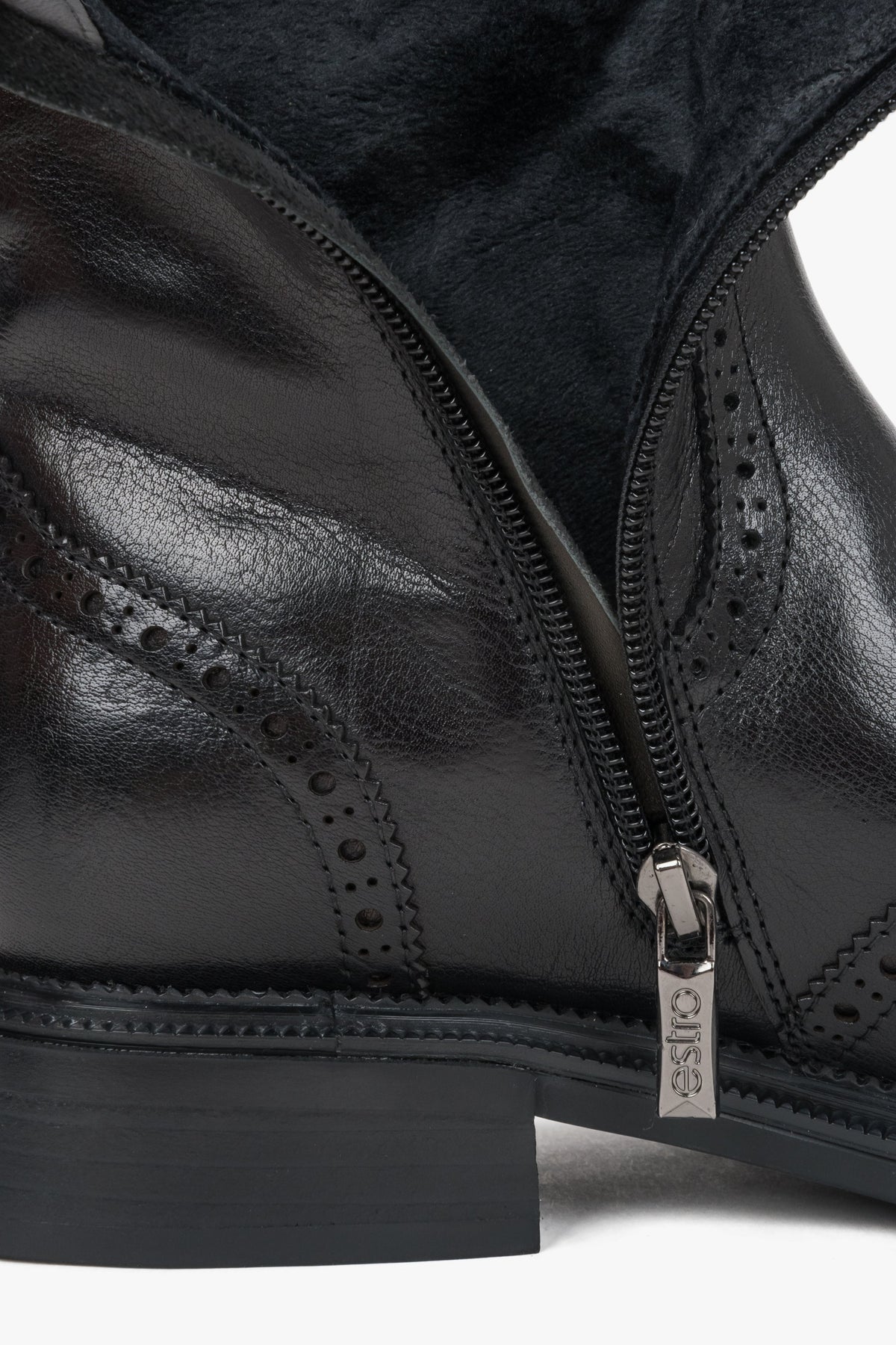 Black women's ankle boots Estro, made of natural leather, with brogue detailing - close-up of details.