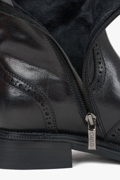 Black women's ankle boots Estro, made of natural leather, with brogue detailing - close-up of details.