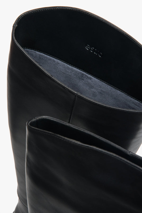 In genuine leather, classic black women’s knee-high boots with a flat sole Estro.