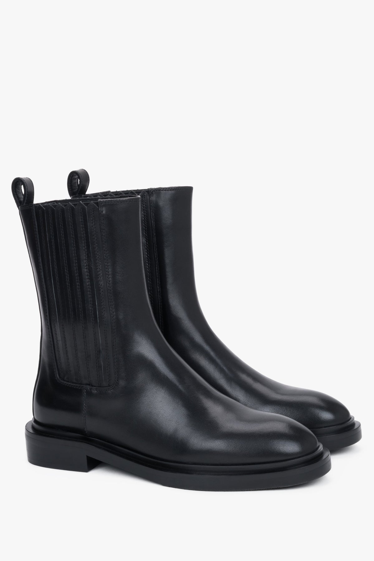 Made of natural leather, women's black Chelsea boots with elastic side panels Estro.