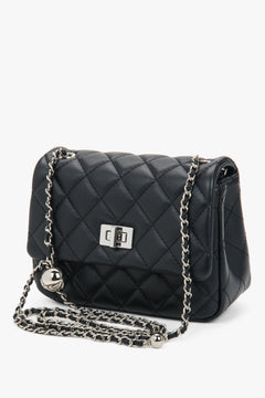 Estro - women's classic black quilted shoulder bag with silver chain.