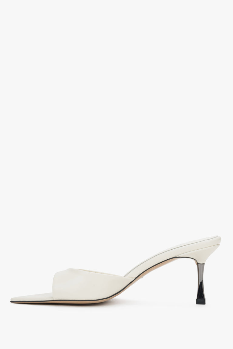 Low side view of women's cream beige leather heeled mules by Estro