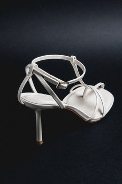 Back view of women's cream beige leather high heel sandals