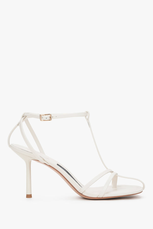 Low side view of women's cream beige leather sandals by Estro Selection