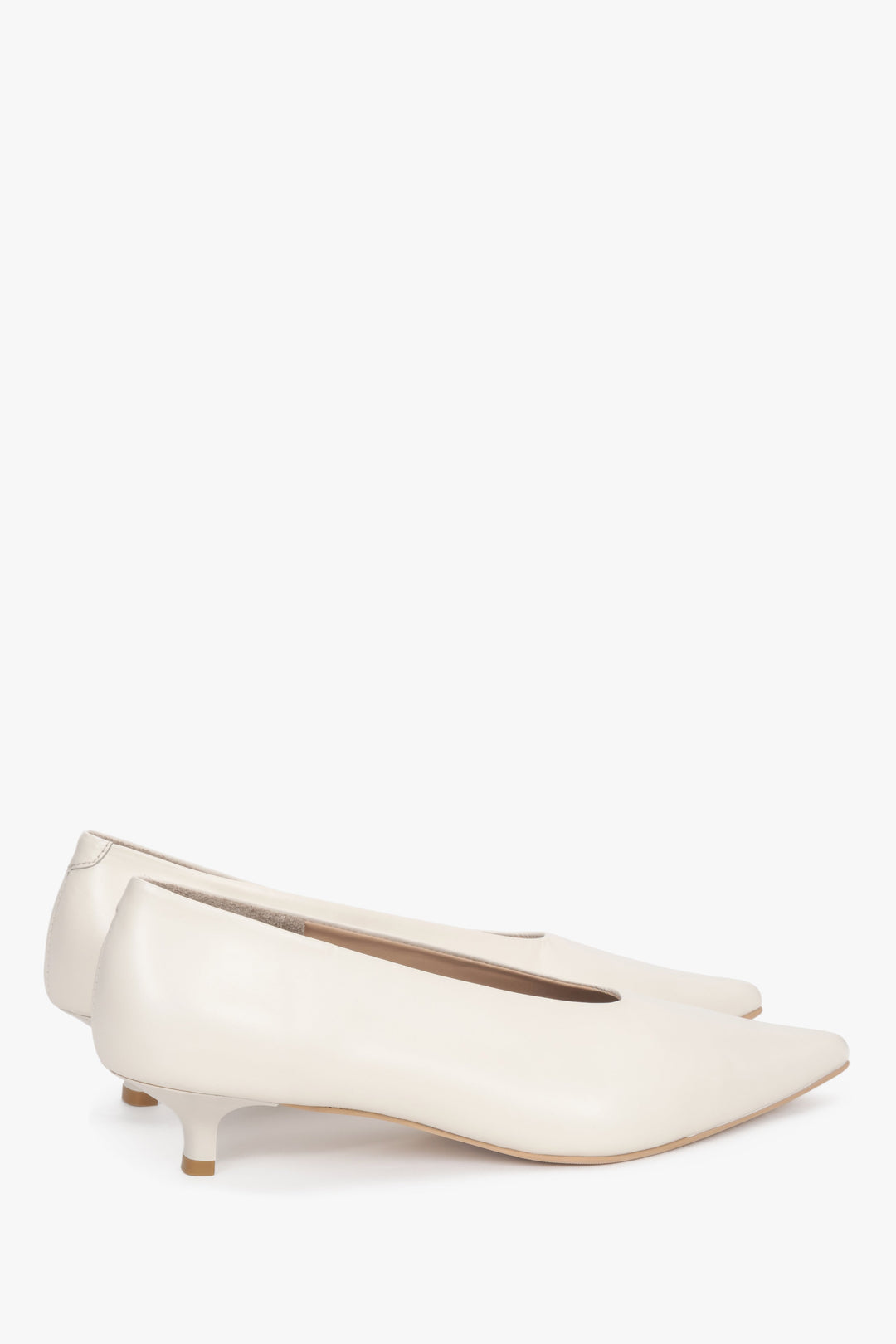 Women’s cream beige slip-on kitten heels made from genuine leather.