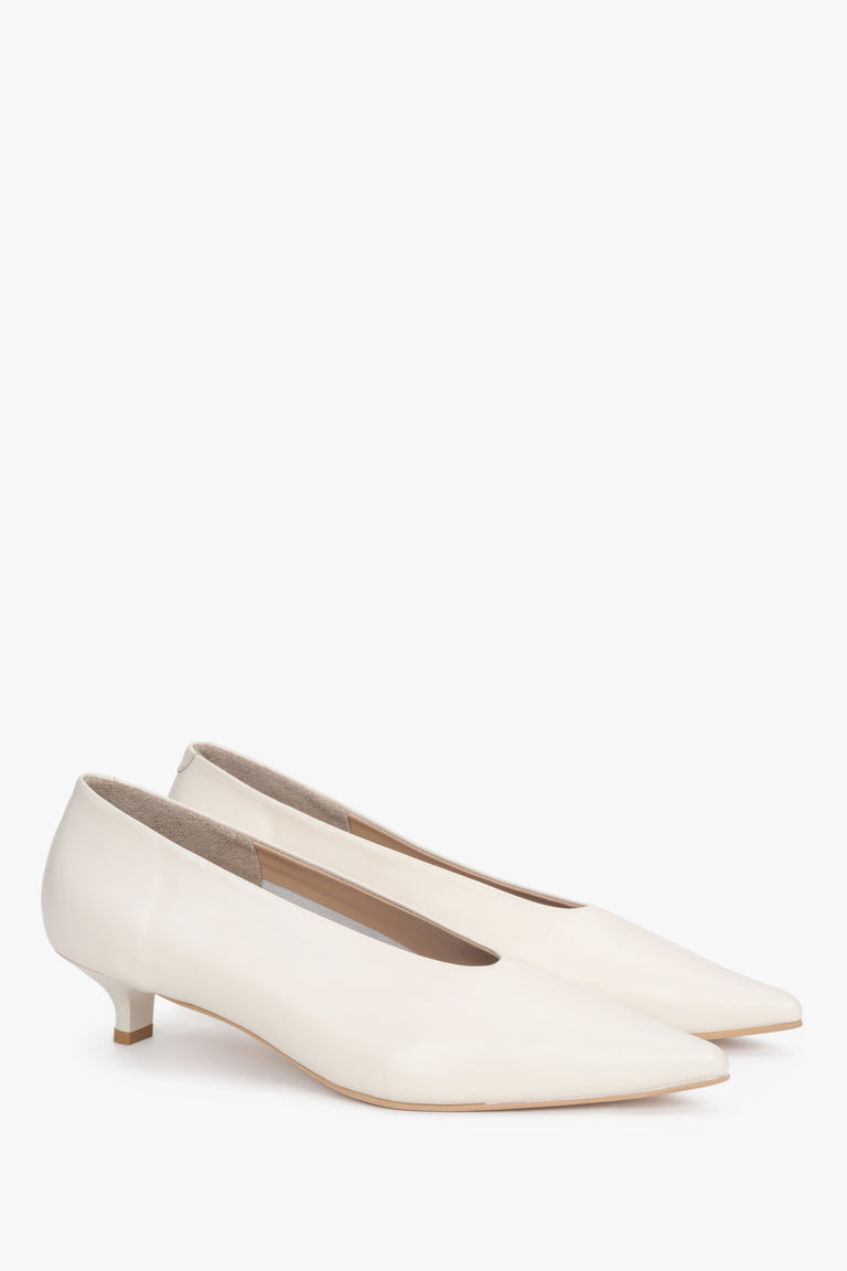 Side view of cream beige kitten heels with a low 4.5 cm heel.