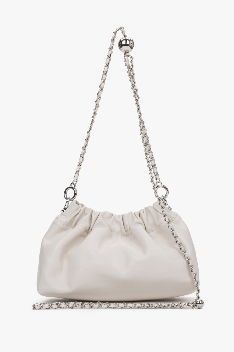 Women's cream beige leather shoulder bag with silver chain strap