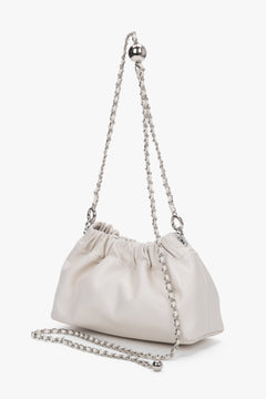 Side view of women's cream beige leather shoulder bag by Estro Selection