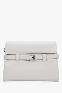 Women's cream beige leather shoulder bag with decorative buckle by Estro
