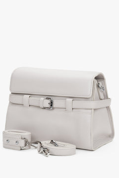 Front view of women's cream beige leather shoulder bag with buckle by Estro