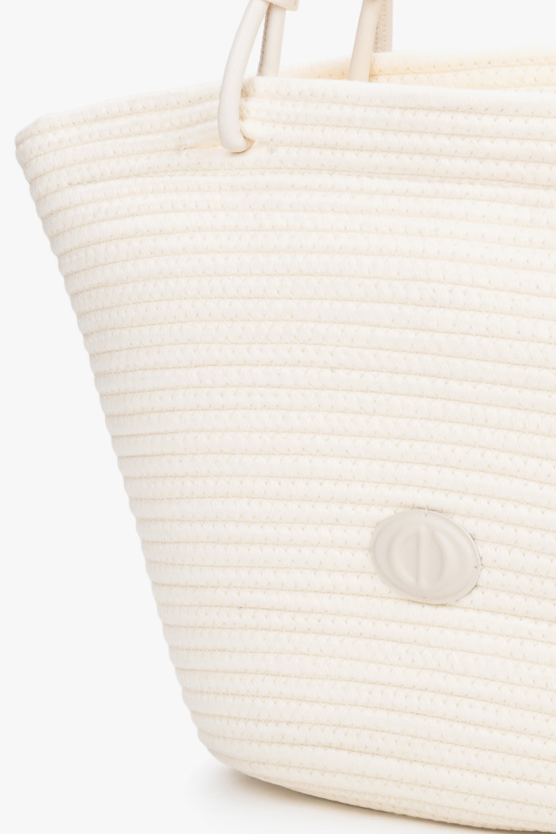Detail view of cream beige textile shopper bag with straw-like texture