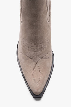 Premium Italian natural velour dark beige cowboy boots for women on a stable heel.