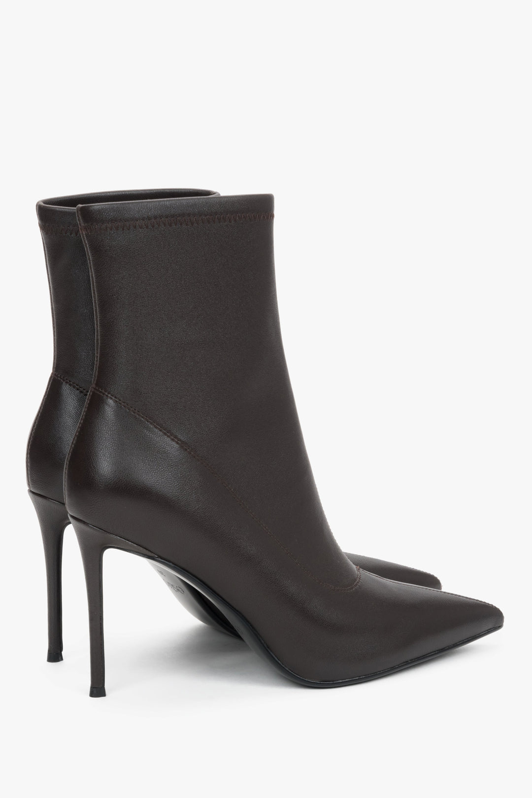 Women’s dark brown ankle boots with an elastic shaft on a high stiletto heel by Estro.