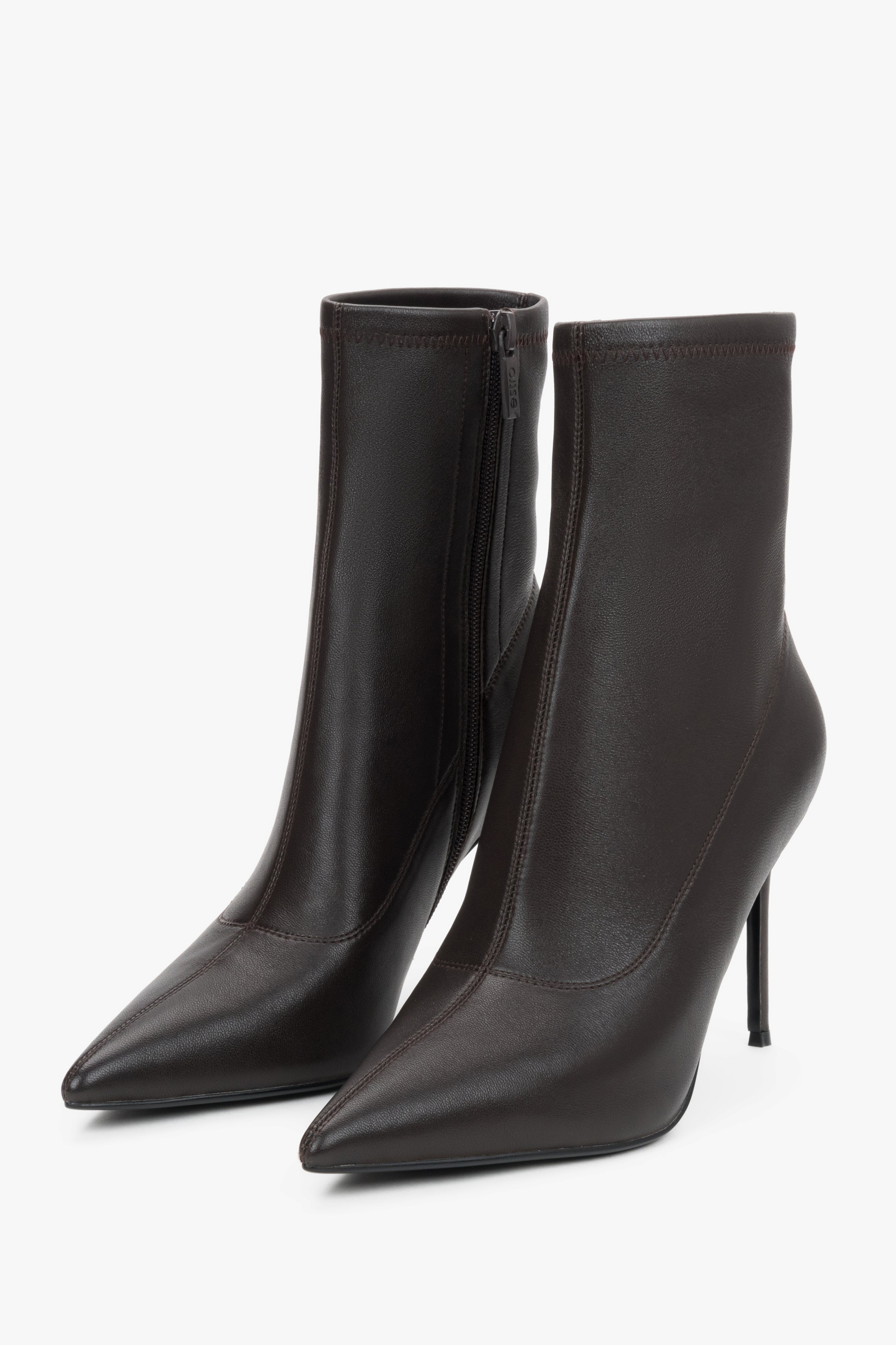 Women’s dark brown ankle boots with an elastic shaft on a high stiletto heel.