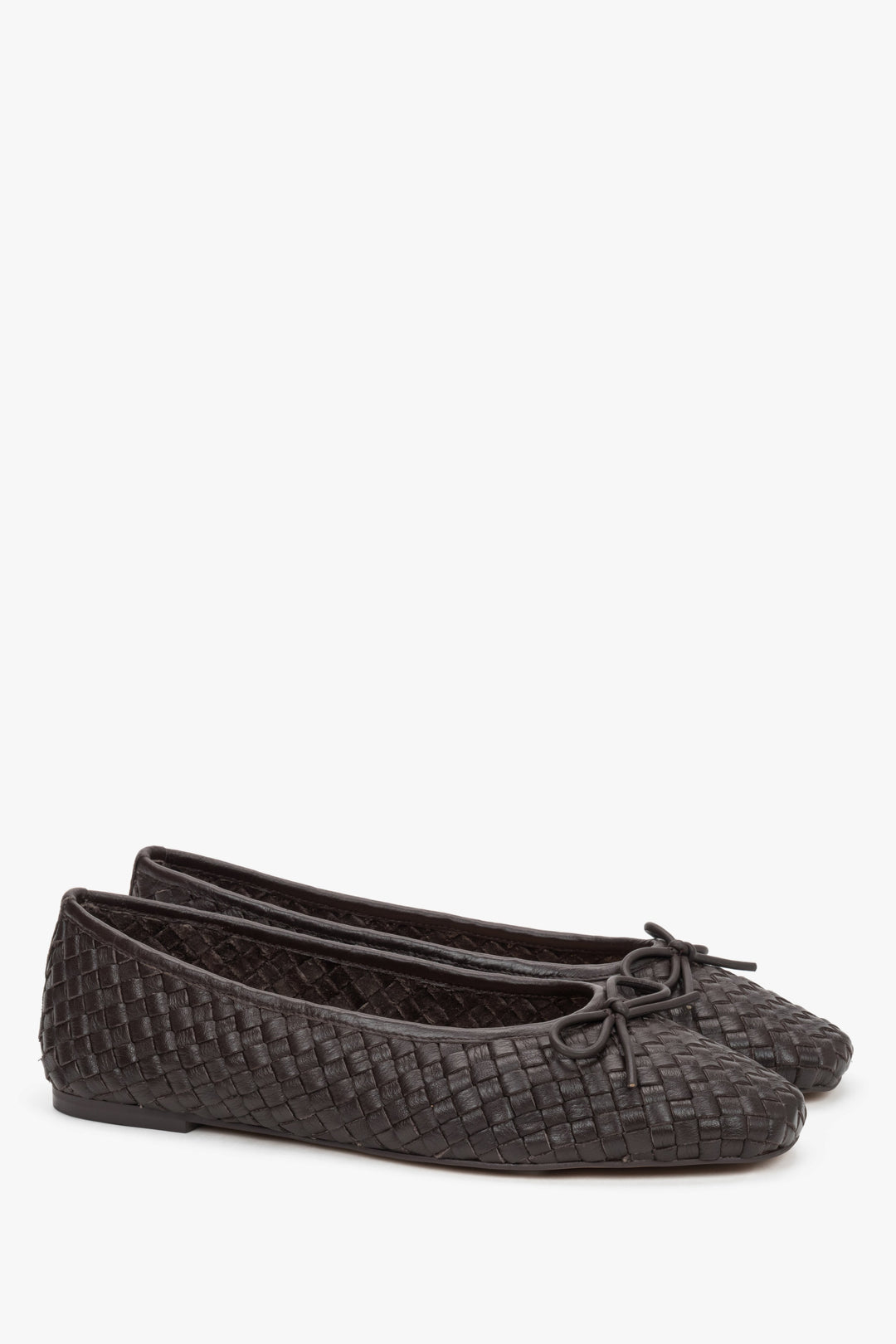 Close-up of dark brown Estro women’s ballet flats, showcasing the precise braided natural leather texture and a classic upper silhouette.