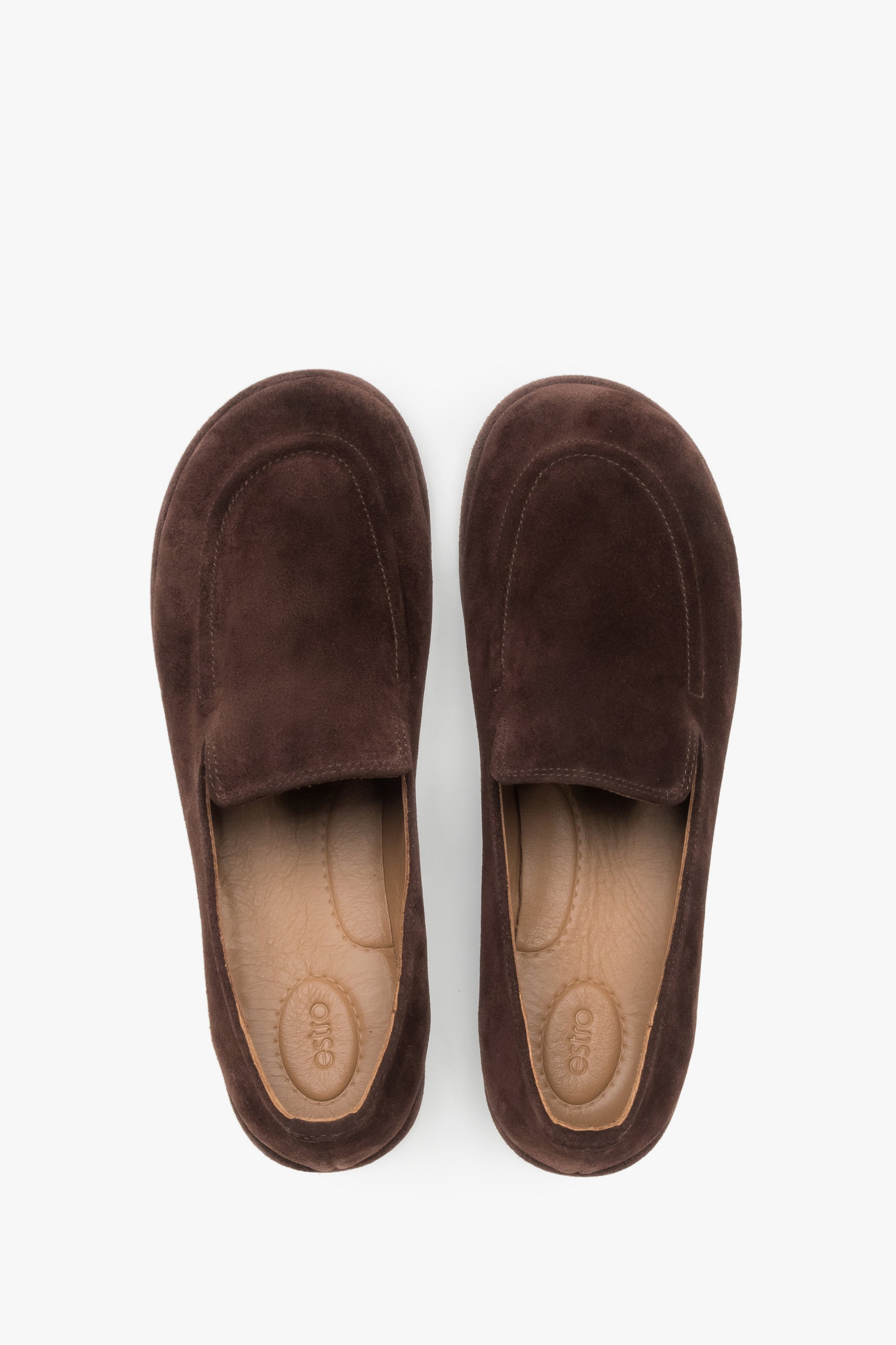 Top view of a pair of shoes showcasing a widened anatomical toe area, classic stitching on the toe cap, and a light leather insole.